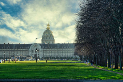 Group of people in front of historical building