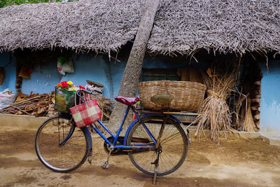 Bicycle parked on street outside house