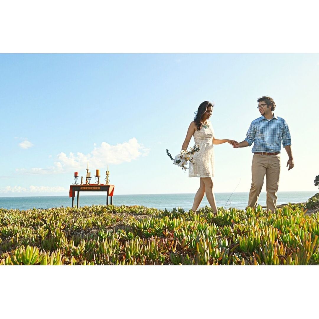 sea, horizon over water, lifestyles, water, leisure activity, sky, person, tranquil scene, grass, nature, beauty in nature, tranquility, rear view, scenics, men, standing, togetherness, beach