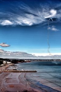 Scenic view of sea against blue sky