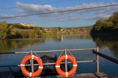 Moored boats in calm lake