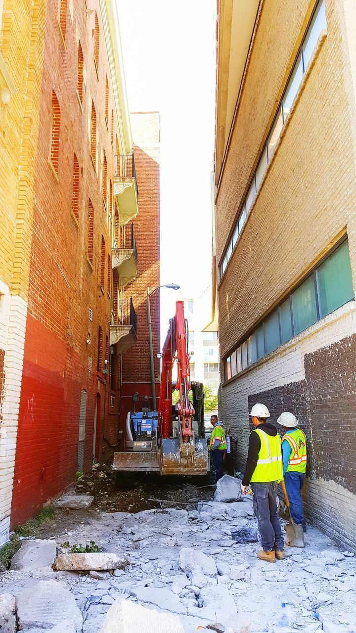 MAN WORKING IN BUILDING