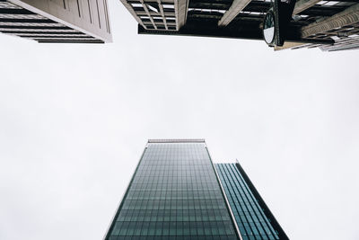 Low angle view of modern buildings against clear sky