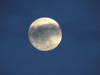 Low angle view of moon against sky at night