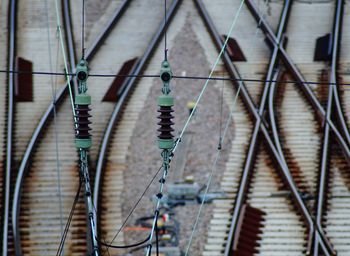 Full frame shot of metallic structure hanging on wall of building