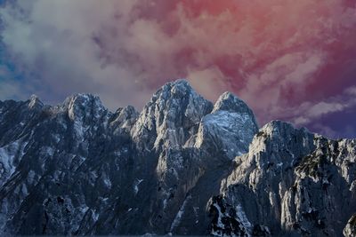 Scenic view of snow mountains against sky