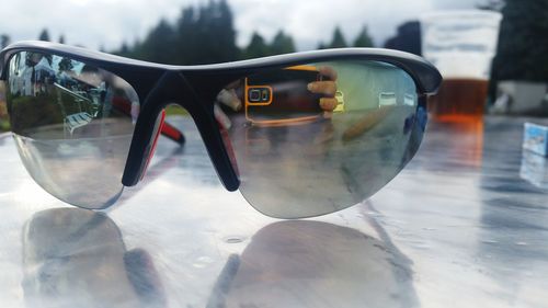 Close-up of sunglasses in water