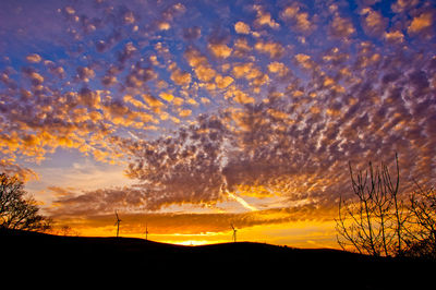 Scenic view of dramatic sky during sunset