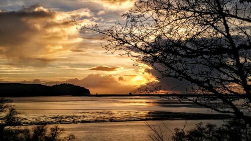 Scenic view of sea against dramatic sky