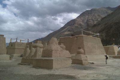 Built structure against cloudy sky