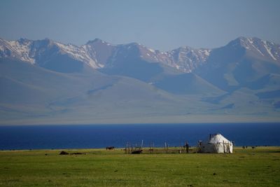 Scenic view of snowcapped mountains against sky