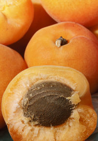 Several ripe large juicy apricots close up