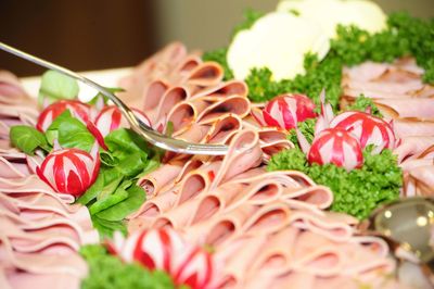 A platter of cold meats as snacks in food catering