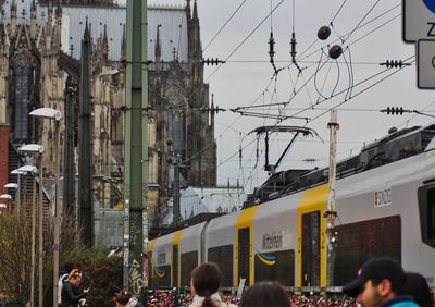 Group of people on train in city