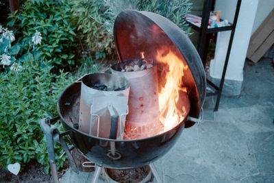 High angle view of fire in container