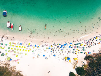 High angle view of beach umbrellas against sky