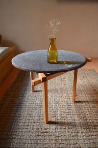 Designer side or center coffee table, top in natural stone, volcanic stone, quarry or terrazz