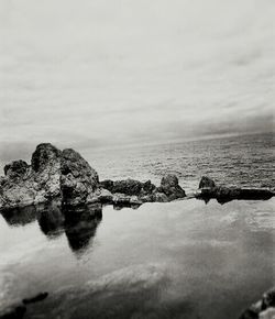 Scenic view of calm sea against sky