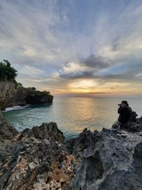 Scenic view of sea against sky during sunset