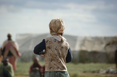 Rear view of a woman on landscape