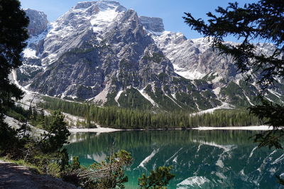 Scenic view of pragser wildsee lake by mountains