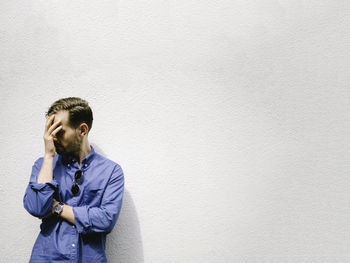 Man against white background