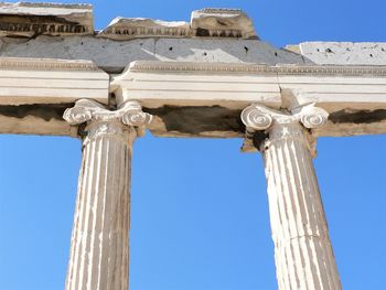 Detailed and close-up view of ancient greek columns in the acropolis of athens, greece.