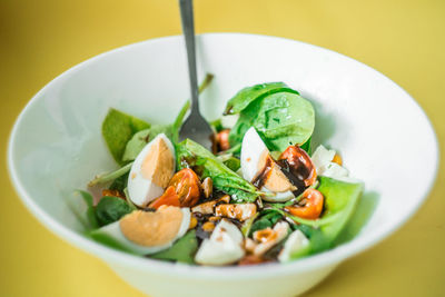 Close-up of salad in bowl on table