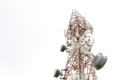 Low angle view of communications tower against clear sky