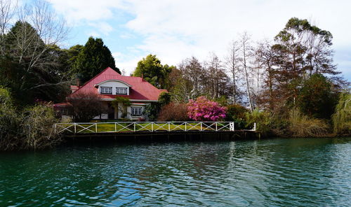 Pond with buildings in background