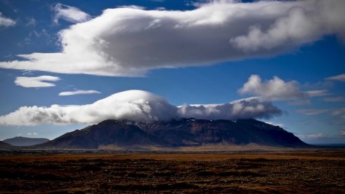 View of landscape against cloudy sky