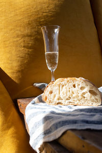 Gastronomic photography of natural bread and cup with drink