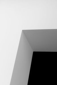 Low angle view of modern building against clear sky