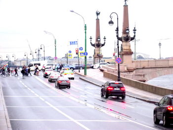 Cars on road in city