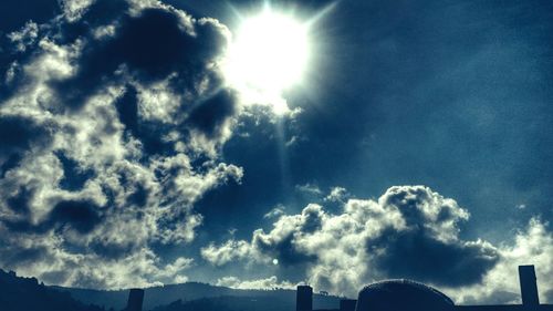 Sun shining through clouds