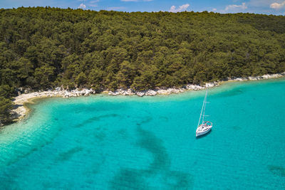 High angle view of sailboat in sea