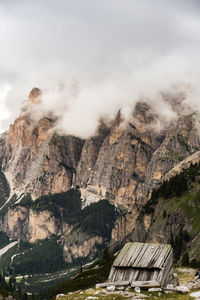 Scenic view of mountains amidst clouds