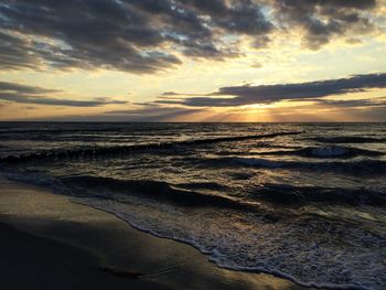 Scenic view of sea at sunset