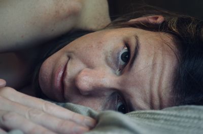 Close-up of young woman looking at the camera