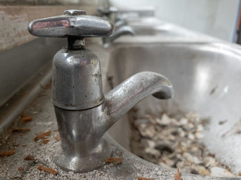 Close-up of water faucet