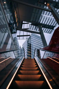 Low angle view of escalator in building