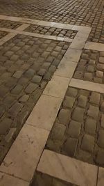 High angle view of cobblestone footpath