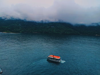 Red boat in the ocean