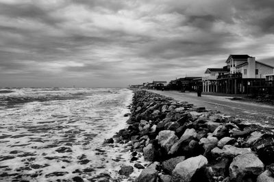 Scenic view of sea against cloudy sky