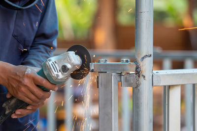 Man working on metal structure