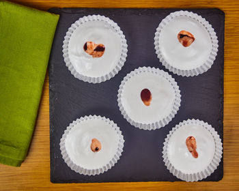 High angle view of cupcakes on table