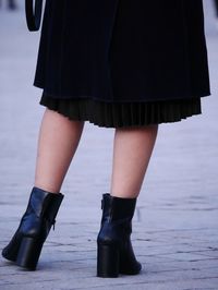 Low section of woman standing on floor