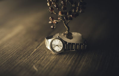 Close-up of clock on table