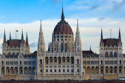 Buildings in city against sky