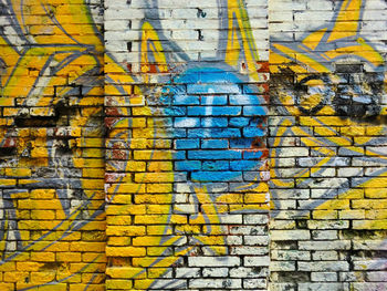 Full frame shot of multi colored brick wall